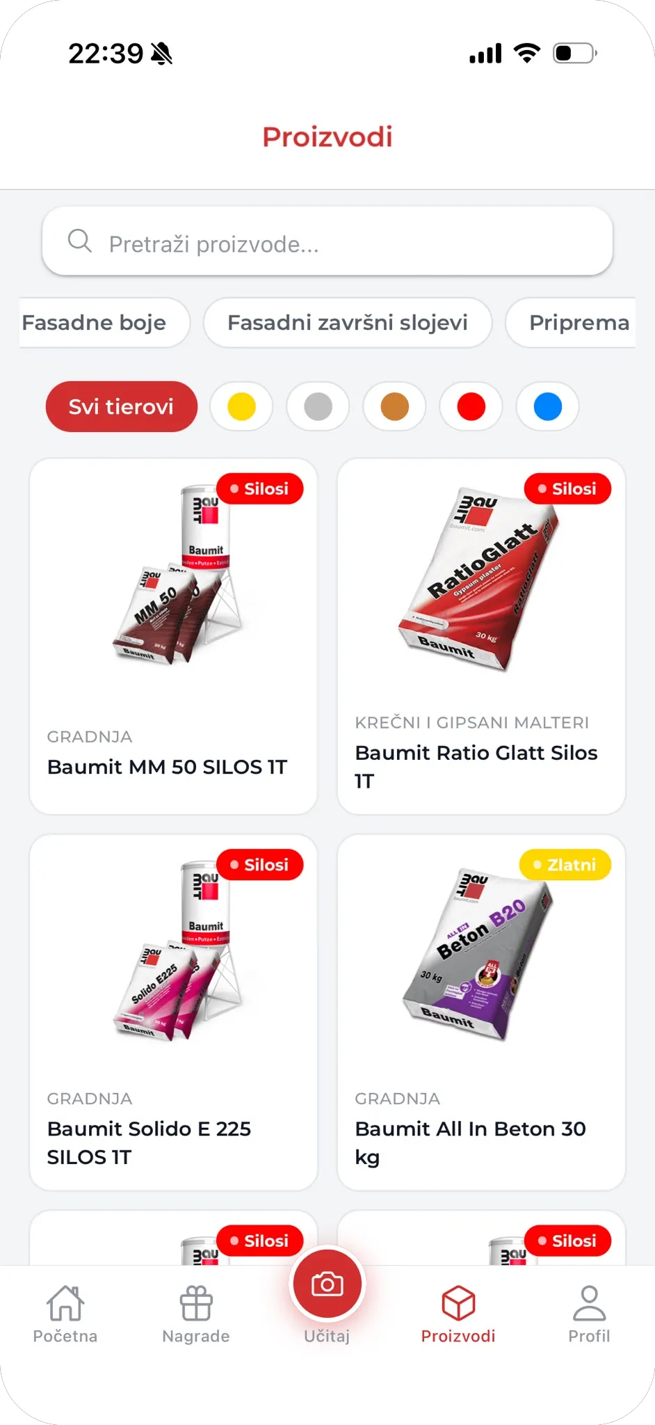 Baumit product catalogue with category filters and tier badges on each product.